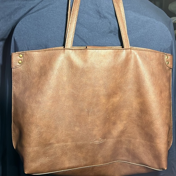 Lucky Brand brown studded purse with cutouts and Teal & horseshoe print lining. - Picture 5 of 8